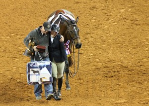Lainie DeBoer and Brad Foss celebrate at the 2013 AQHA World Championship Show.